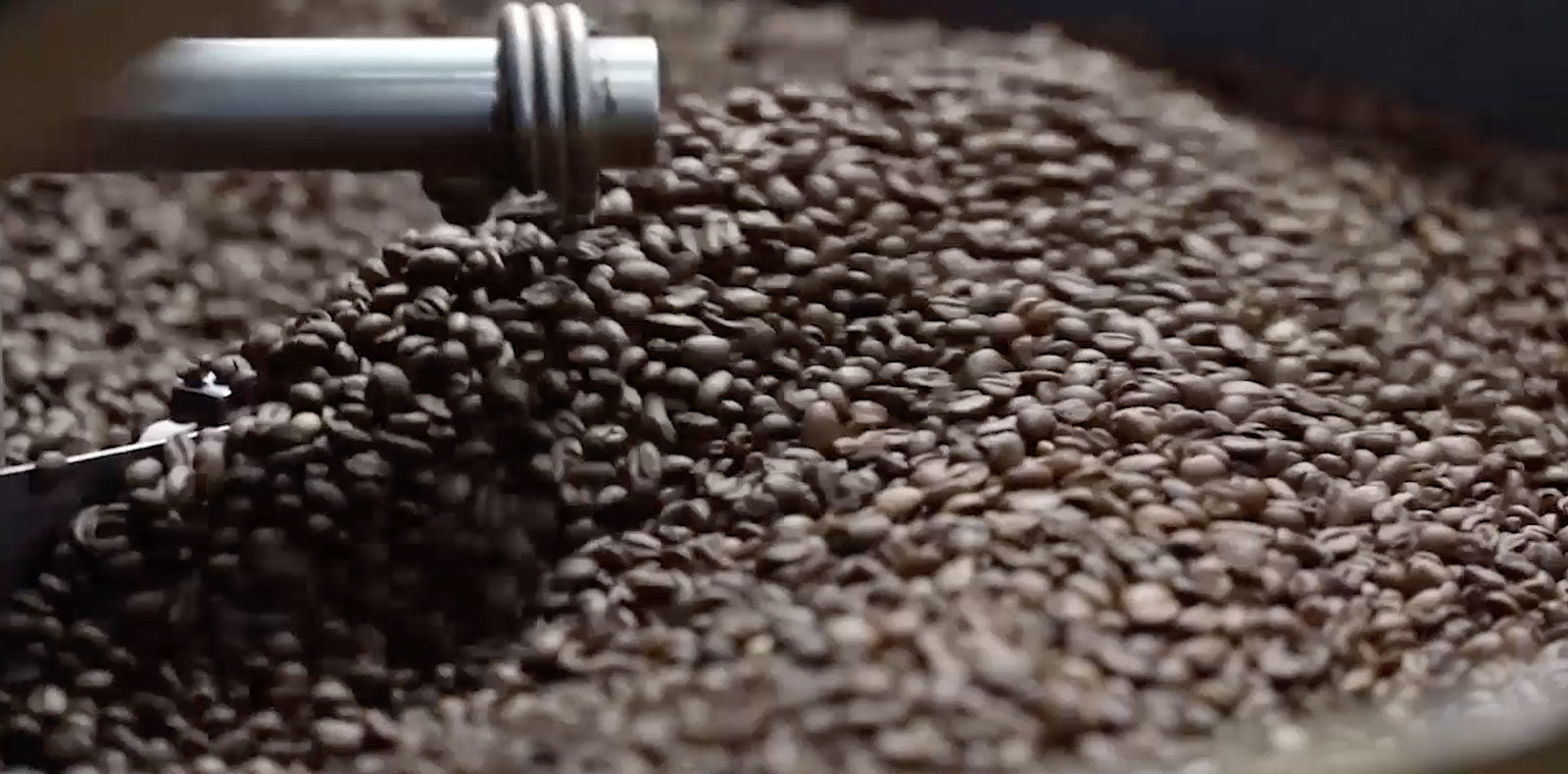 A coffee beans spilling out of a container