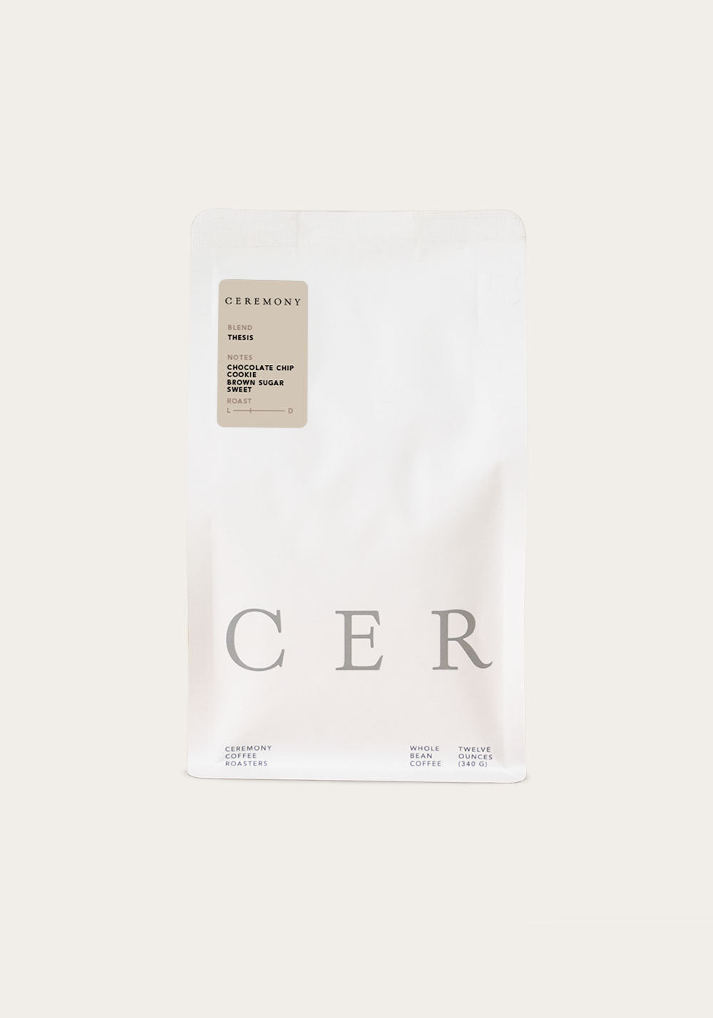 Thesis 10.00% Off Auto renew coffee bag featuring minimalist white packaging with CER branding and a small beige label displaying product details, presented against a neutral background
