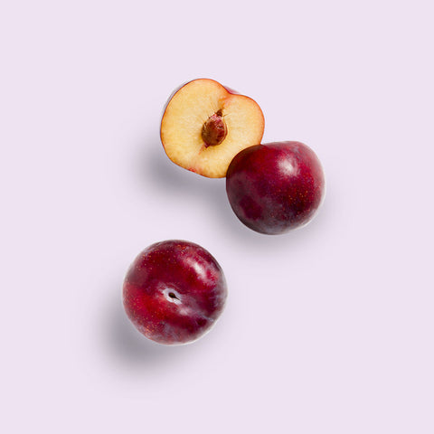 plums on a purple background