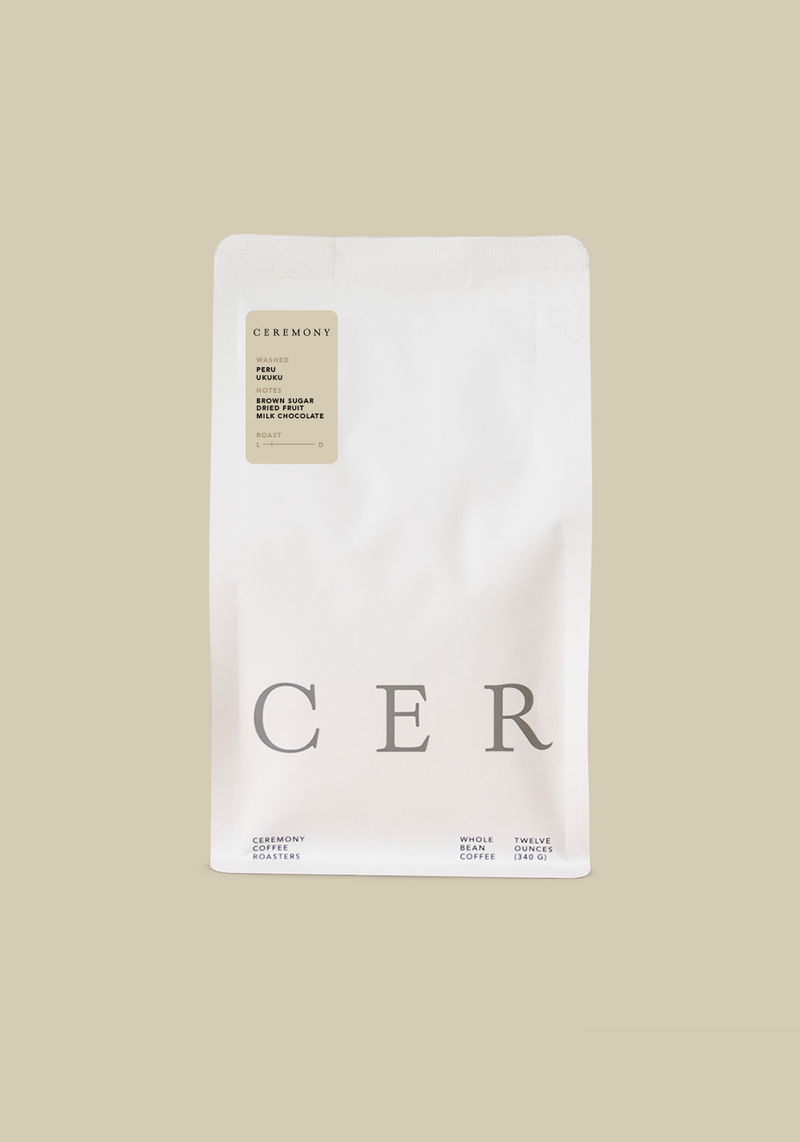 White coffee bag of Peru Ukuku with 'CER' branding on a beige background